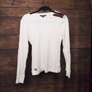 Two shirts with zip up shoulders